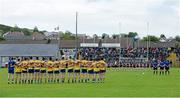 20 June 2015; Roscommon and Sligo players stand for a minute's silence in memory of the six Irish students that died in Berkeley, USA. Connacht GAA Football Senior Championship, Semi-Final, Sligo v Roscommon, Markievicz Park, Sligo. Picture credit: Oliver McVeigh / SPORTSFILE