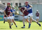 20 June 2015; Padraig Mannion, Galway, in action against Joe Fitzpatrick, Laois. Leinster GAA Hurling Senior Championship, Semi-Final, Galway v Laois, O'Connor Park, Tullamore, Co. Offaly. Photo by Sportsfile
