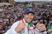 26 August 2008; Olympic silver medallist Kenny Egan is greeted by supporters upon his arrival at Clondalkin, Co. Dublin. Picture credit: David Maher / SPORTSFILE
