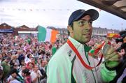 26 August 2008; Olympic silver medallist Kenny Egan is greeted by supporters upon his arrival at Clondalkin, Co. Dublin. Picture credit: David Maher / SPORTSFILE