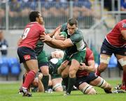 30 August 2008; Cian Healy, Leinster, is tackled by Will Genia, left, and Van Humphreys, Queensland Reds. Pre-season friendly, Queensland Reds v Leinster, Donnybrook Stadium, Donnybrook, Dublin. Picture credit: Brendan Moran / SPORTSFILE