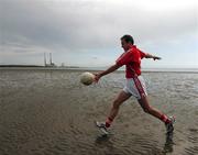 17 July 2007; Cork footballer James Masters, who was announced as an Ariel GAA Championship Bright Ambassador for 2007. This summer Ariel is giving away free exclusive GAA towels with promotional packs. Martello Tower, Sandymount Strand, Dublin. Picture credit: Ray McManus / SPORTSFILE