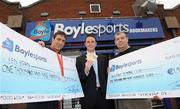 29 August 2008; Olympic boxing silver medalist Kenny Egan, left, with Leon Blanche from Boylesports, centre, and Gerard Flemming, Kenny's coach in Neilstown Boxing Club, at the Boylesports shop in Neilstown. Kenny collected his winnings after he placed a bet on himself to win a medal in Beijing. Boylesports generously trebled his winnings and gave the same amount to Kenny’s club in Neilstown to prepare the boxers of the future. Boylseports, Clondalkin, Dublin. Picture credit: Brian Lawless / SPORTSFILE