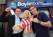 29 August 2008; Olympic boxing silver medalist Kenny Egan, right, with Leon Blanche from Boylesports, and model Clare Tully, at the Boylesports shop in Neilstown. Kenny collected his winnings after he placed a bet on himself to win a medal in Beijing. Boylesports generously trebled his winnings and gave the same amount to Kenny’s club in Neilstown to prepare the boxers of the future. Boylseports, Clondalkin, Dublin. Picture credit: Brian Lawless / SPORTSFILE