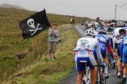 29 August 2008; A young fan waves a flag as the riders approach the summit of Maumturk, Co. Galway. 2008 Tour of Ireland - Stage 3, Ballinrobe - Galway. Picture credit: Stephen McCarthy / SPORTSFILE