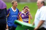 30 August 2008; A dejected Tara Moloney, Wexford, with manager Michael O'Neill at the end of the game. TG4 All-Ireland Ladies Intermediate Football Championship Semi-Final, Tipperary v Wexford, Pairc Tailteann, Navan, Co. Meath. Photo by Sportsfile