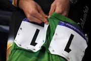 31 August 2008; Mark Cavendish, Team Columbia, pins on his race number to his An Post sponsored green jersey ahead of the start of the stage in Killarney, Co. Kerry. 2008 Tour of Ireland - Stage 5, Killarney - Cork. Picture credit: Stephen McCarthy / SPORTSFILE  *** Local Caption ***