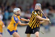 31 August 2008; Claire Phelan, Kilkenny, in action against Aiveen O'Shea, Clare. All-Ireland Minor A Championship Final, Clare v Kilkenny, Geraldine Park, Athy, Co. Kildare. Photo by Sportsfile