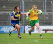 21 June 2015; Amber Barrett, Donegal, in action against Aisling Reynolds, Longford. Aisling McGing U21 B Championship Final, Donegal v Longford, Markiewicz Park, Sligo. Picture credit: Seb Daly / SPORTSFILE