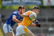 21 June 2015; Ciarán Garland, Antrim, in action against Dillon Raythorne, Cavan. Electric Ireland Ulster GAA Football Minor Championship, Semi Final, Cavan v Antrim, Kingspan Breffni Park, Cavan. Picture credit: Dáire Brennan / SPORTSFILE