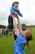 21 June 2015; Niamh Rickard, Dublin, lifts her 18-month-old cousin Shay Sheridan in celebration after the game. Aisling McGing U21 ‘A’ Championship Final, Cork v Dublin, MacDonagh Park, Nenagh, Tipperary. Picture credit: Cody Glenn / SPORTSFILE