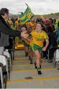 21 June 2015; Shannon McGroddy, Donegal, is congratulated as she leads her team mates up to receive the winning trophy. Aisling McGing U21 B Championship Final, Donegal v Longford, Markiewicz Park, Sligo. Picture credit: Seb Daly / SPORTSFILE