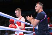 21 June 2015; Dean Walsh, Ireland, with coach Billy Walsh during his Men's Boxing Light Welter 64kg Round of 16 bout against Maxim Dadashev, Russia. 2015 European Games, Crystal Hall, Baku, Azerbaijan. Picture credit: Stephen McCarthy / SPORTSFILE
