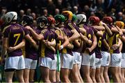 21 June 2015; Wexford players stand together during the playing of the national anthem. Leinster GAA Hurling Senior Championship, Semi-Final, Kilkenny v Wexford, Nowlan Park, Kilkenny. Picture credit: David Maher / SPORTSFILE