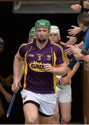 21 June 2015; Wexford captain Matthew O'Hanlon leads the Wexford team out for the start of the game. Leinster GAA Hurling Senior Championship, Semi-Final, Kilkenny v Wexford, Nowlan Park, Kilkenny. Picture credit: David Maher / SPORTSFILE