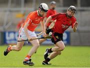 21 June 2015; Martin Moan, Armagh, in action against Sean Ennis, Down. Ulster GAA Hurling Senior Championship, Quarter-Final, Armagh v Down, Athletic Grounds, Armagh. Picture credit: Sam Barnes / SPORTSFILE