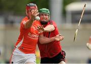 21 June 2015; Artie McGuinness, Armagh, loses his hurley in action against Fintan Conway, Down. Ulster GAA Hurling Senior Championship, Quarter-Final, Armagh v Down, Athletic Grounds, Armagh. Picture credit: Sam Barnes / SPORTSFILE