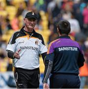 21 June 2015; Kilkenny manager Brian Cody prepare's to shake hands with Wexford manager Liam Dunne, at the end of the game. Leinster GAA Hurling Senior Championship, Semi-Final, Kilkenny v Wexford, Nowlan Park, Kilkenny. Picture credit: David Maher / SPORTSFILE