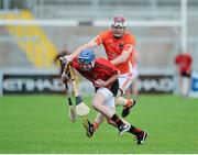 21 June 2015; Eoin McGuinness, Armagh, in action against Danny Toner, Down. Ulster GAA Hurling Senior Championship, Quarter-Final, Armagh v Down, Athletic Grounds, Armagh. Picture credit: Sam Barnes / SPORTSFILE