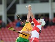 21 June 2015; Sean Curran, Donegal, in action against Sean McCullagh, Derry. Ulster GAA Hurling Senior Championship, Quarter-Final, Donegal v Derry, Celtic Park, Derry. Picture credit: Oliver McVeigh / SPORTSFILE