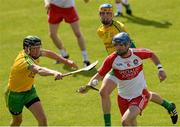 21 June 2015; Liam Hinphey, Derry, in action against Danny Cullen, Donegal. Ulster GAA Hurling Senior Championship, Quarter-Final, Donegal v Derry, Celtic Park, Derry. Picture credit: Oliver McVeigh / SPORTSFILE