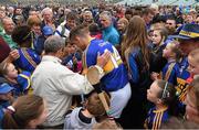 21 June 2015; Tipperary's Seamus Callanan is applauded by supporters as he signs autographs after the game. Munster GAA Hurling Senior Championship, Semi-Final, Limerick v Tipperary, Gaelic Grounds, Limerick. Picture credit: Brendan Moran / SPORTSFILE
