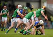 21 June 2015; John O'Dwyer, left, and Niall O'Meara, Tipperary, compete for possession with Limerick players, from left, Tom Condon, Stephen Walsh and Richie McCarthy. Munster GAA Hurling Senior Championship, Semi-Final, Limerick v Tipperary, Gaelic Grounds, Limerick. Picture credit: Brendan Moran / SPORTSFILE