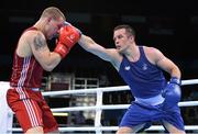 21 June 2015; Darren O'Neill, Ireland, right, exchanges punches with Raitis Sinkevics, Latvia, during their Men's Boxing Heavy 91kg Round of 16 bout. 2015 European Games, Crystal Hall, Baku, Azerbaijan. Picture credit: Stephen McCarthy / SPORTSFILE