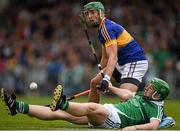 21 June 2015; Shane Dowling, Limerick, in action against James Barry, Tipperary. Munster GAA Hurling Senior Championship, Semi-Final, Limerick v Tipperary, Gaelic Grounds, Limerick. Picture credit: Ray McManus / SPORTSFILE