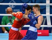 22 June 2015; Brendan Irvine, Ireland, right, exchanges punches with Salman Alizada, Azerbaijan, during their Men's Boxing Light Fly 49kg Quarter Final bout. 2015 European Games, Crystal Hall, Baku, Azerbaijan. Picture credit: Stephen McCarthy / SPORTSFILE