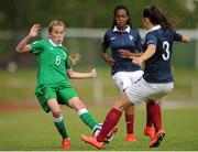 22 June 2015; Evelyn Daly, Republic of Ireland, in action against Agathe Ollivier, France. UEFA European Women's Under-17 Championship Finals, Group B, Republic of Ireland v France. Korinn, Kopavogur, Iceland. Picture credit: Eoin Noonan / SPORTSFILE