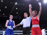 22 June 2015; Saiana Sagataeva, Russia, is declared victorious over Ceire Smith, Ireland, by referee Gerardo Mariano Poggi, following their Women's Boxing Fly 51kg Quarter Final bout. 2015 European Games, Crystal Hall, Baku, Azerbaijan. Picture credit: Stephen McCarthy / SPORTSFILE