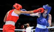 22 June 2015; Ceire Smith, Ireland, right, exchanges punches with Saiana Sagataeva, Russia, during their Women's Boxing Fly 51kg Quarter Final bout. 2015 European Games, Crystal Hall, Baku, Azerbaijan. Picture credit: Stephen McCarthy / SPORTSFILE