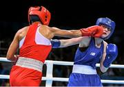 22 June 2015; Ceire Smith, Ireland, right, exchanges punches with Saiana Sagataeva, Russia, during their Women's Boxing Fly 51kg Quarter Final bout. 2015 European Games, Crystal Hall, Baku, Azerbaijan. Picture credit: Stephen McCarthy / SPORTSFILE