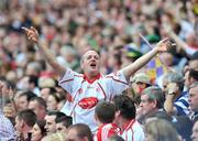 31 August 2008; A Tyrone supporter celebrates during the closing stages of the game. GAA Football All-Ireland Senior Championship Semi-Final, Tyrone v Wexford, Croke Park, Dublin. Picture credit: David Maher / SPORTSFILE