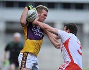 31 August 2008; P.J Banville, Wexford, in action against Justin McMahon, Tyrone. GAA Football All-Ireland Senior Championship Semi-Final, Tyrone v Wexford, Croke Park, Dublin. Picture credit: David Maher / SPORTSFILE