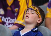31 August 2008; Wexford fan Brian Stafford, age 5, from Ferns, Co. Wexford, takes in a snooze during half-time. GAA Football All-Ireland Senior Championship Semi-Final, Tyrone v Wexford, Croke Park, Dublin. Picture credit: Brendan Moran / SPORTSFILE