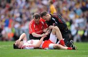 31 August 2008; Sean Cavanagh, Tyrone, is attended to by medical staff before leaving the pitch. GAA Football All-Ireland Senior Championship Semi-Final, Tyrone v Wexford, Croke Park, Dublin. Picture credit: Brendan Moran / SPORTSFILE