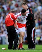 31 August 2008; Sean Cavanagh, Tyrone, is attended to by medical staff before leaving the pitch. GAA Football All-Ireland Senior Championship Semi-Final, Tyrone v Wexford, Croke Park, Dublin. Picture credit: Brendan Moran / SPORTSFILE