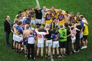 31 August 2008; Wexford County Chairman Ger Doyle and the team members listen to manager Jason Ryan as he addresses them after the game. GAA Football All-Ireland Senior Championship Semi-Final, Tyrone v Wexford, Croke Park, Dublin. Picture credit: Ray McManus / SPORTSFILE