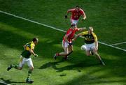 31 August 2008; Kerry's Tommy Walsh supported Kieran Donaghy in action against Derek Kavanagh and Diarmuid Duggan, 2, Cork. GAA Football All-Ireland Senior Championship Semi-Final Replay, Kerry v Cork, Croke Park, Dublin. Picture credit: Ray McManus / SPORTSFILE