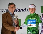 31 August 2008; An Post Chief Executive Donal O'Connell presents Russell Downing, Pinarello CandiTV, with his trophy after winning the An Post sponsored Green Jersey. 2008 Tour of Ireland - Stage 5, Killarney - Cork. Picture credit: Stephen McCarthy / SPORTSFILE  *** Local Caption ***