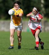 31 August 2008; Aine McIlroy, Antrim, in action against Ursula Mullan, Derry. TG4 All-Ireland Ladies Junior Football Championship Semi-Final, Antrim v Derry, O'Rahilly Park, Mullaghbawn, Co. Armagh. Picture credit: Oliver McVeigh / SPORTSFILE