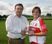 31 August 2008; Ulster Ladies GAA President Gerry Doherty, presents Ashleen Kealey, Derry, with her player of the match award. TG4 All-Ireland Ladies Junior Football Championship Semi-Final, Antrim v Derry, O'Rahilly Park, Mullaghbawn, Co. Armagh. Picture credit: Oliver McVeigh / SPORTSFILE