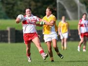 31 August 2008; Ashleen Kealey, Derry, in action against Kelly McCoy, Antrim. TG4 All-Ireland Ladies Junior Football Championship Semi-Final, Antrim v Derry, O'Rahilly Park, Mullaghbawn, Co. Armagh. Picture credit: Oliver McVeigh / SPORTSFILE