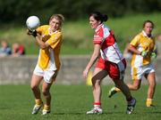 31 August 2008; Kelly McCoy, Antrim, in action against Una Harkin, Derry. TG4 All-Ireland Ladies Junior Football Championship Semi-Final, Antrim v Derry, O'Rahilly Park, Mullaghbawn, Co. Armagh. Picture credit: Oliver McVeigh / SPORTSFILE