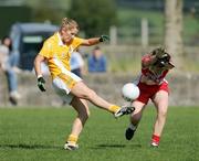 31 August 2008; Kelly McCoy, Antrim, in action against Nuala Doherty, Derry. TG4 All-Ireland Ladies Junior Football Championship Semi-Final, Antrim v Derry, O'Rahilly Park, Mullaghbawn, Co. Armagh. Picture credit: Oliver McVeigh / SPORTSFILE