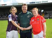 31 August 2008; Galway captain Tracey Leonard shakes hands with Cork captain Denise Cronin in the company of referee Sean McIntyre. All-Ireland Ladies U16 A Football Championship Final, Cork v Galway, McDonagh Park, Nenagh, Co. Tipperary. Picture credit: Brian Lawless / SPORTSFILE