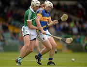 21 June 2015; David Butler, Tipperary, in action against Barry O'Connell, Limerick. Munster GAA Hurling Intermediate Championship, Semi-Final, Limerick v Tipperary, Gaelic Grounds, Limerick. Picture credit: Brendan Moran / SPORTSFILE