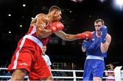 22 June 2015; Dean Gardiner, Ireland, right, exchanges punches with Tony Yoka, France, during their Men's Boxing Super Heavy +91kg Quarter Final bout. 2015 European Games, Crystal Hall, Baku, Azerbaijan. Picture credit: Stephen McCarthy / SPORTSFILE